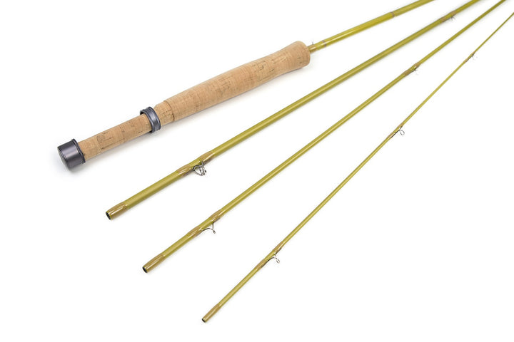 Four sections of a Douglas Upstream fly rod fanned out on white
