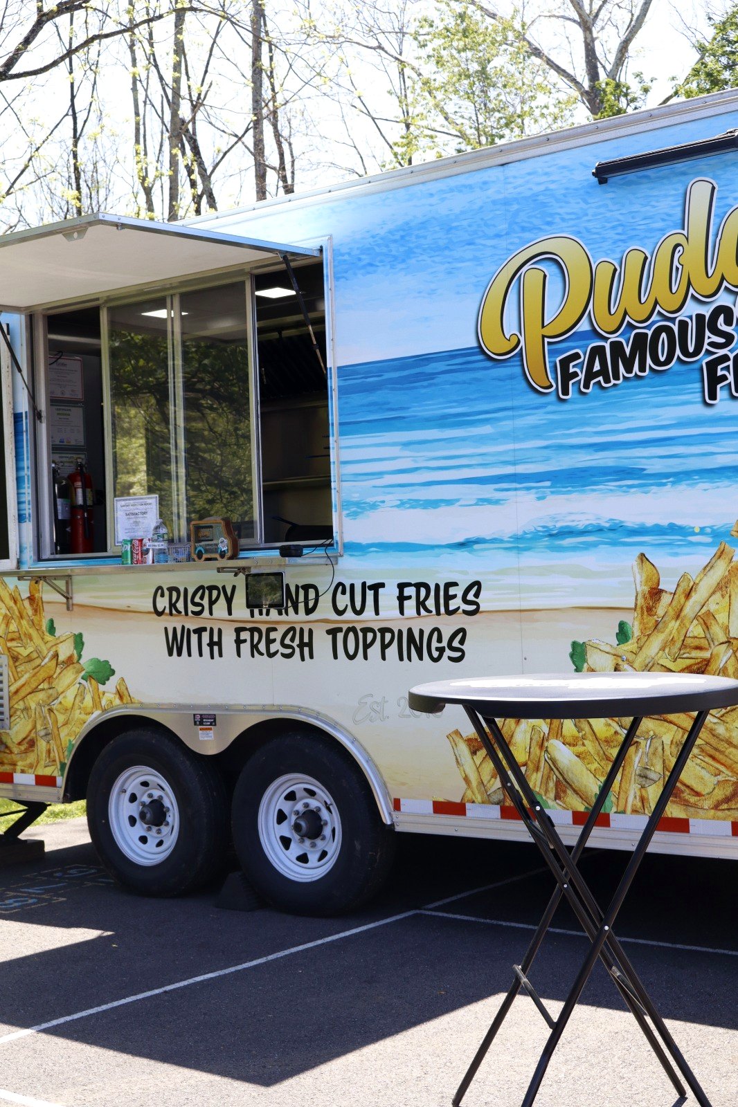 Food truck serving hand cut fries at Trout Fest