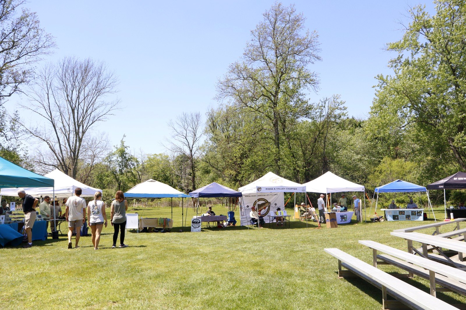 Vendor row on the field at Trout Fest, Califon Island Park