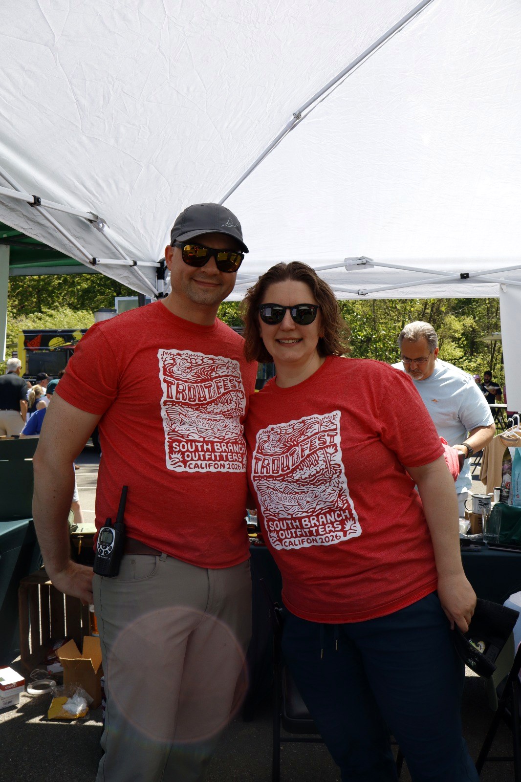 Two Trout Fest visitors in event t-shirts at Califon Island Park